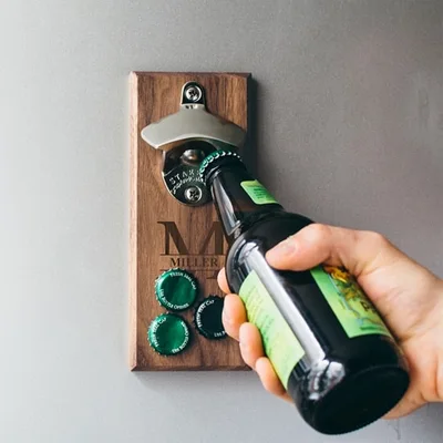 DropCatch magnetic wall-mounted bottle opener